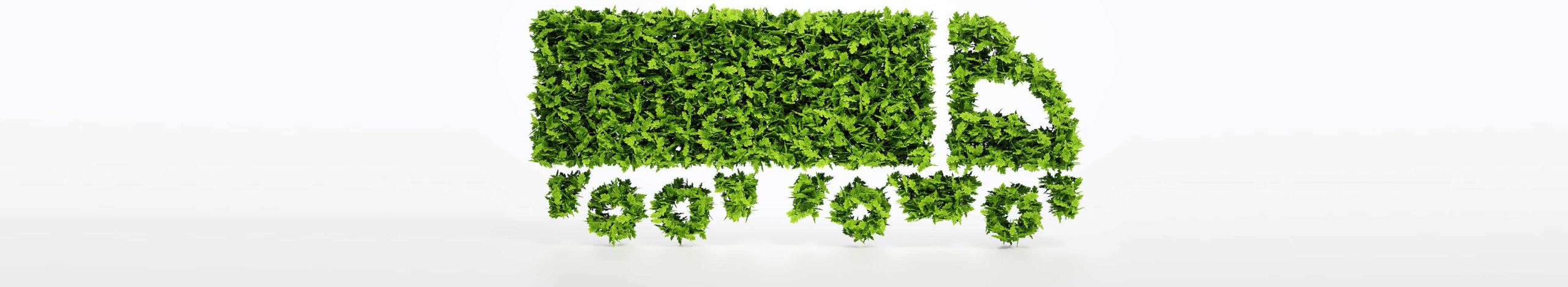 A truck made of grass and green leaves to symbolize the envirnonmental protection through digitization.