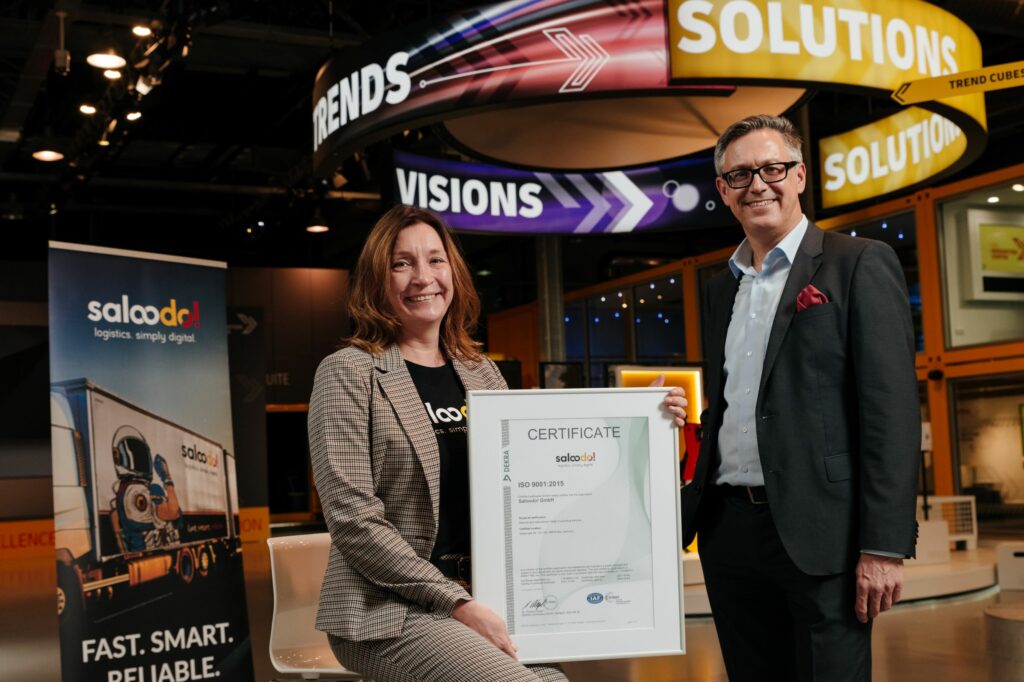 Saloodo! CEO Antje Huber and Rolf Krökel CEO DEKRA at the ISO certification handover in the Innovation Center