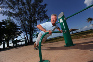 Truck driver does push-ups in the park