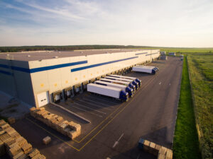 distribution warehouse with trucks of different capacity